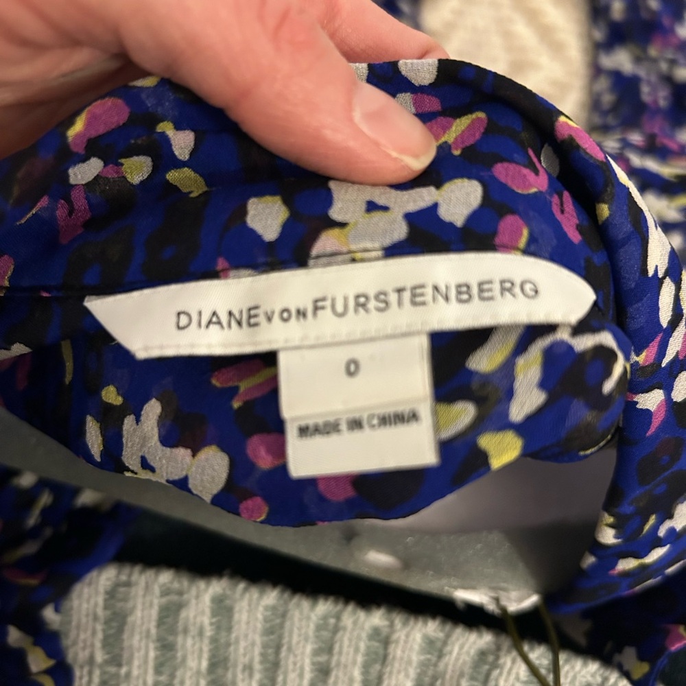 Diane Von Furstenburg multi-color silk shirt…great with black or white jeans!